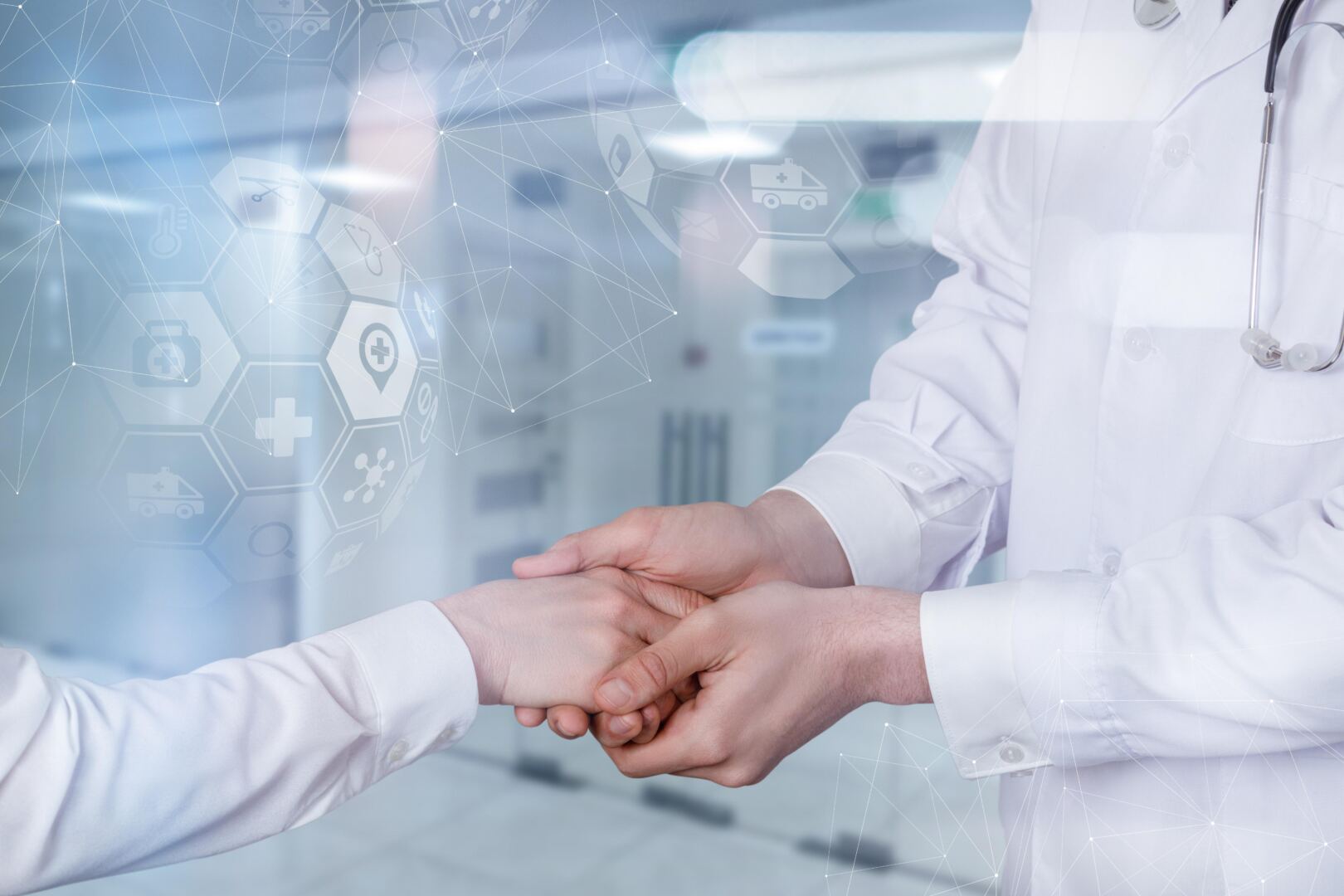 concept care support patientsthe doctor holds patient hand blurred background